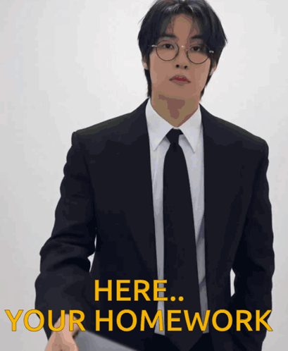 Man in Suit Saying Here Your Homework