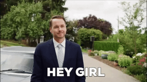Man In Suit Saying Hey Girl Next To Car GIF