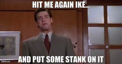 Man in Suit Saying Hit Me Again Ike