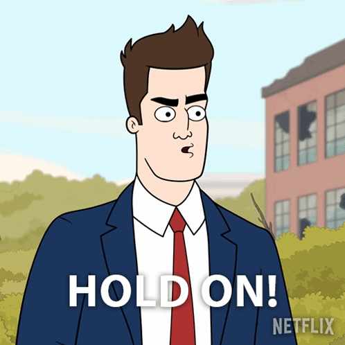 Man in Suit Saying Hold On