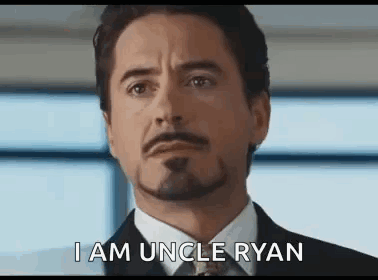 Man in Suit Saying I Am Uncle Ryan