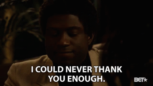 Man in Suit Saying I Could Never Thank You Enough