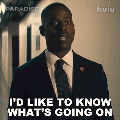 Man in Suit Saying I'd Like to Know What's Going On
