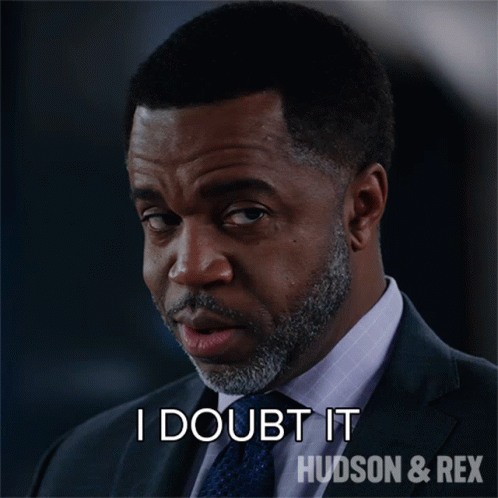 Man in Suit Saying I Doubt It