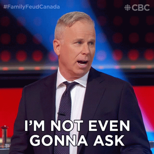 Man in Suit Saying I'm Not Even Gonna Ask