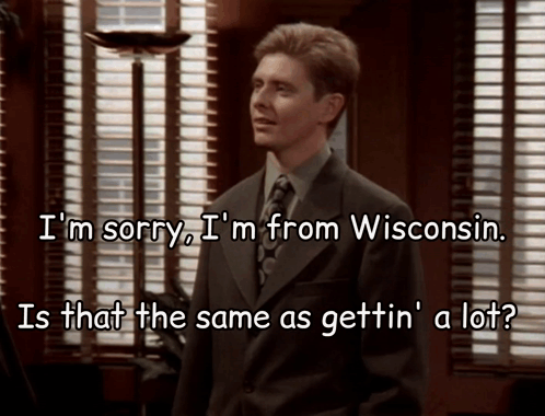 Man in Suit Saying I'm Sorry
