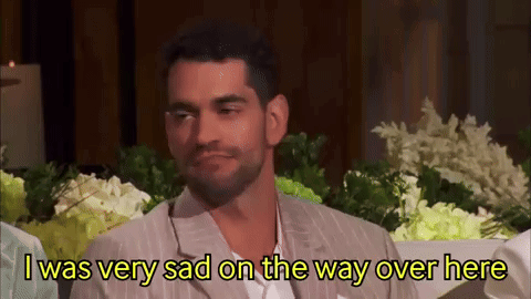 Man in Suit Saying I Was Very Sad on the Way Over Here