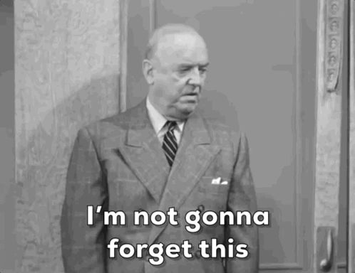 Man in Suit Saying I Won't Forget This