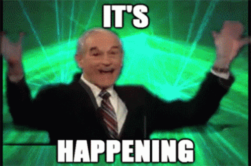 Man in Suit Saying It's Happening Arms Outstretched