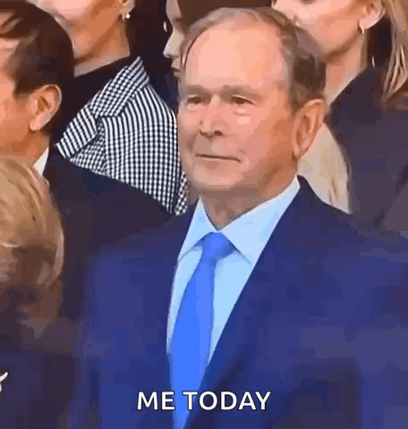 Man in Suit Saying Me Today