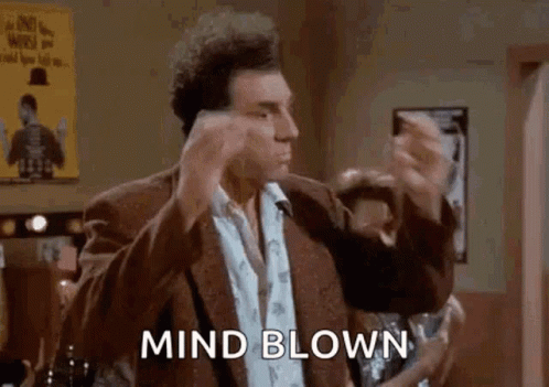 Man in Suit Saying Mind Blown