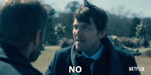Man in Suit Saying No to Another Man