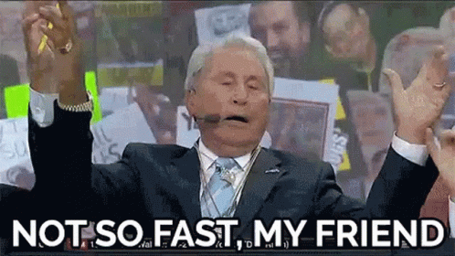 Man in Suit Saying Not So Fast