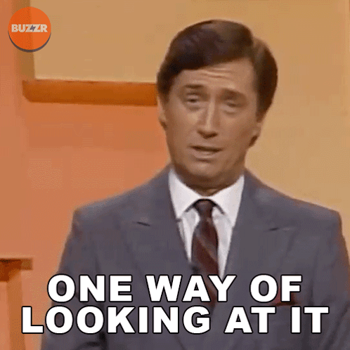 Man in Suit Saying One Way of Looking at It