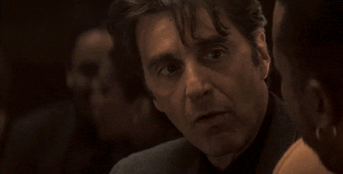Man in Suit Saying Overwhelmed