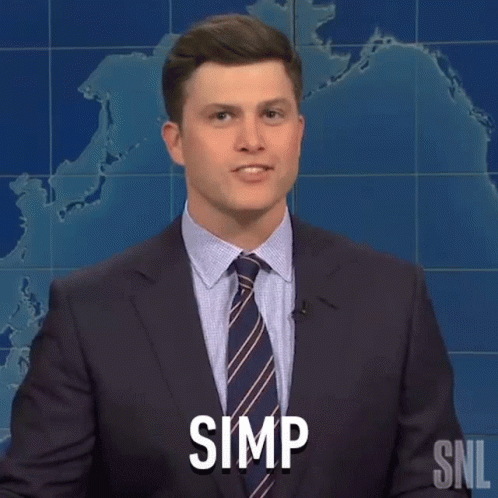 Man in Suit Saying Simp in Front of Map