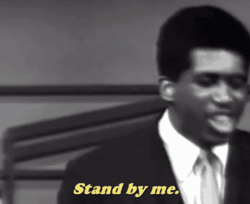 Man in Suit Saying Stand By Me