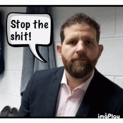Man in Suit Saying Stop the Shit