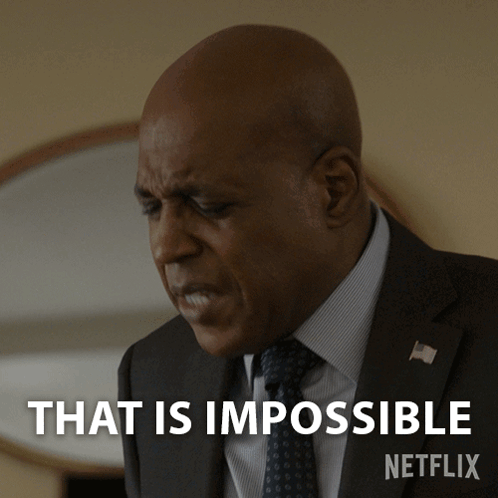 Man in Suit Saying That Is Impossible