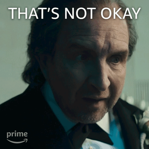 Man in Suit Saying That's Not Okay
