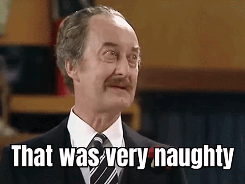 Man In Suit Saying That Was Very Naughty GIF