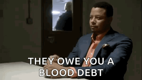 Man in Suit Saying They Owe You a Blood Debt