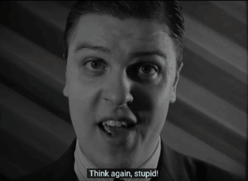 Man in Suit Saying Think Again