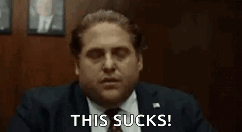 Man in Suit Saying This Sucks