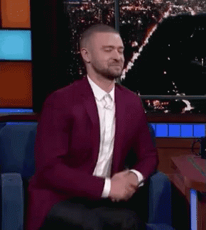 Man in Suit Saying We're Not Friends