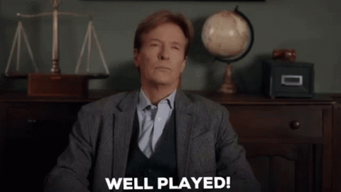 Man In Suit Saying Well Played GIF