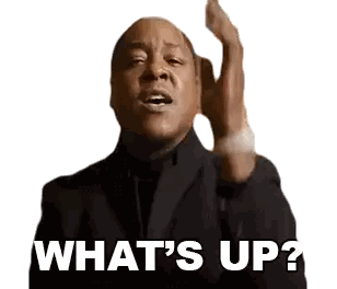 Man in Suit Saying What's Up
