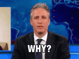 Man In Suit Saying Why GIF