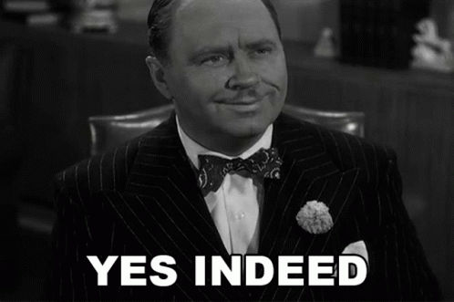 Man in Suit Saying Yes Indeed