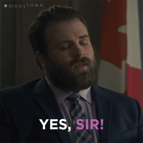 Man in Suit Saying Yes Sir