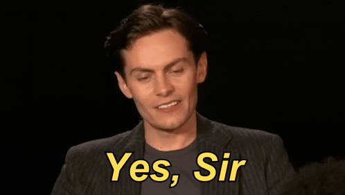 Man in Suit Saying Yes Sir