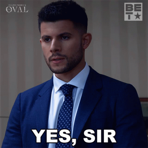 Man in Suit Saying Yes Sir