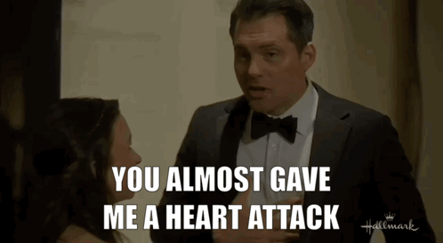 Man in Suit Saying You Almost Gave Me a Heart Attack