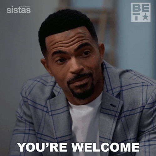 Man in Suit Saying Youre Welcome