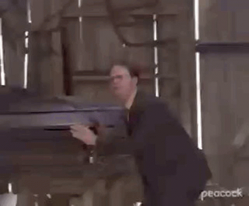 Man In Suit Says Just Get In The Coffin GIF
