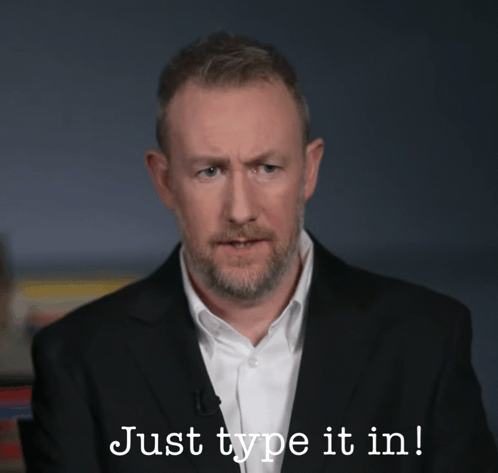 Man in Suit Says Just Type It In