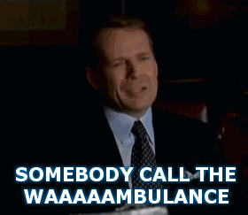 Man In Suit Says Somebody Call The Waaambulance GIF