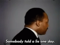 Man in Suit Says Somebody Told a Lie One Day