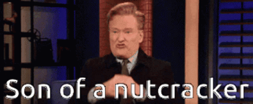 Man In Suit Says Son Of A Nutcracker GIF