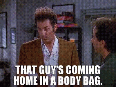 Man In Suit Says That Guy's Coming Home In A Body Bag GIF