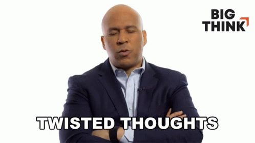 Man in Suit Says Twisted Thoughts in Front of Big Think Logo