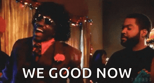 Man In Suit Says We Good Now To Man In Black Shirt GIF
