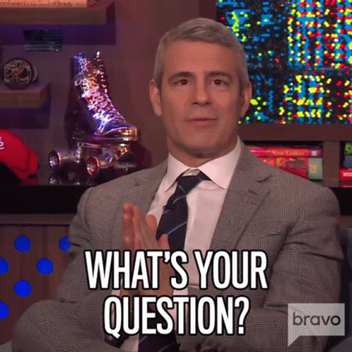 Man in Suit Says What's Your Question on Bravo