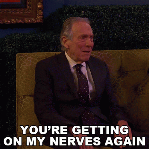 Man in Suit Says You're on My Nerves