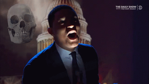Man in Suit Screaming in Front of Skull and Daily Show Logo