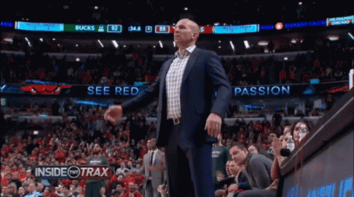 Man in Suit See Red Passion Basketball Game